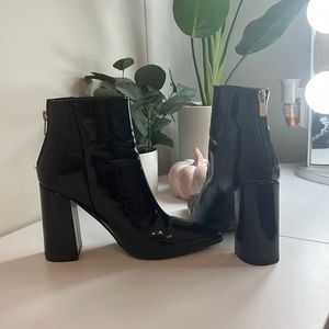 Black patent pointed toe boot